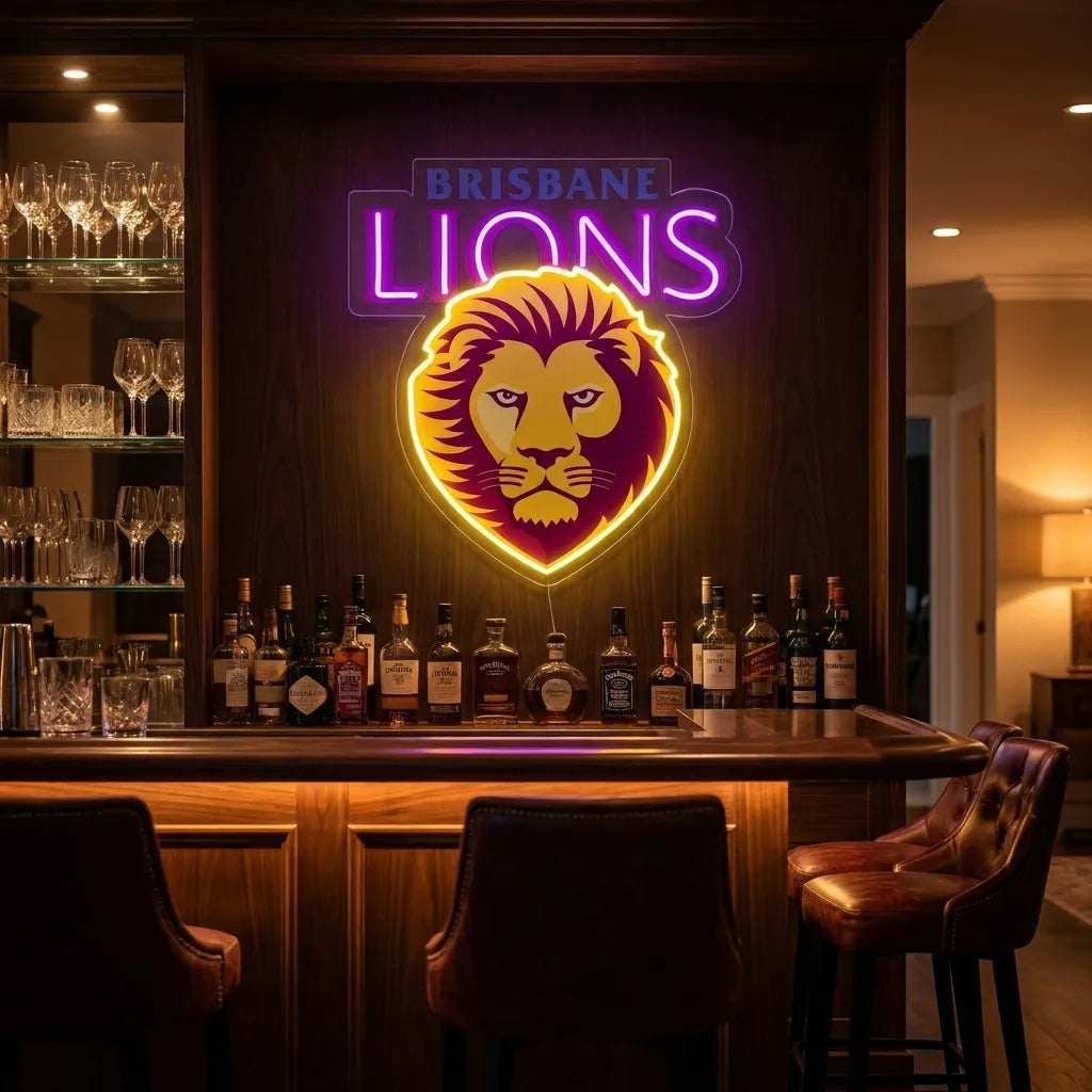 A glowing neon sign reading "BRISBANE LIONS" with a lion head emblem mounted above a wooden bar counter in a dimly lit bar interior.